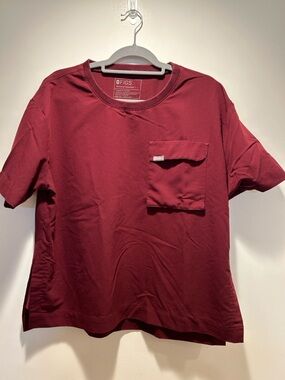 FIGS Women's Crew Neck Pocket Scrub Top in Deep Burgundy